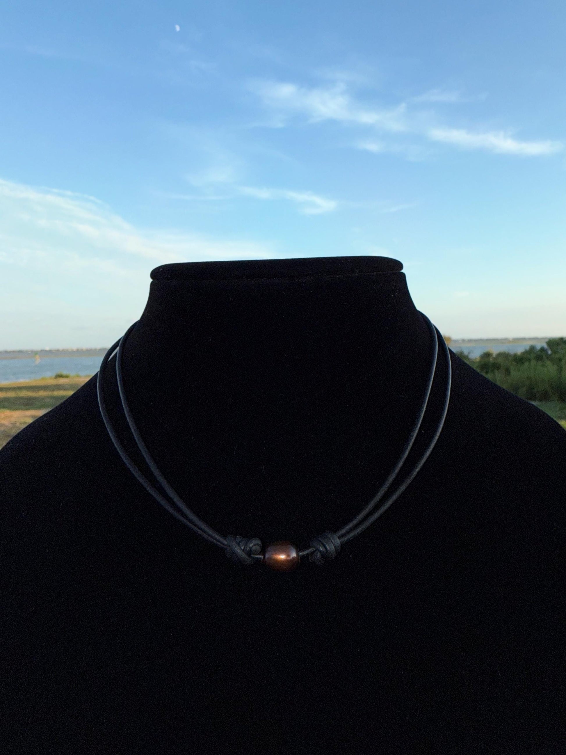 adjustable pearl and leather necklace